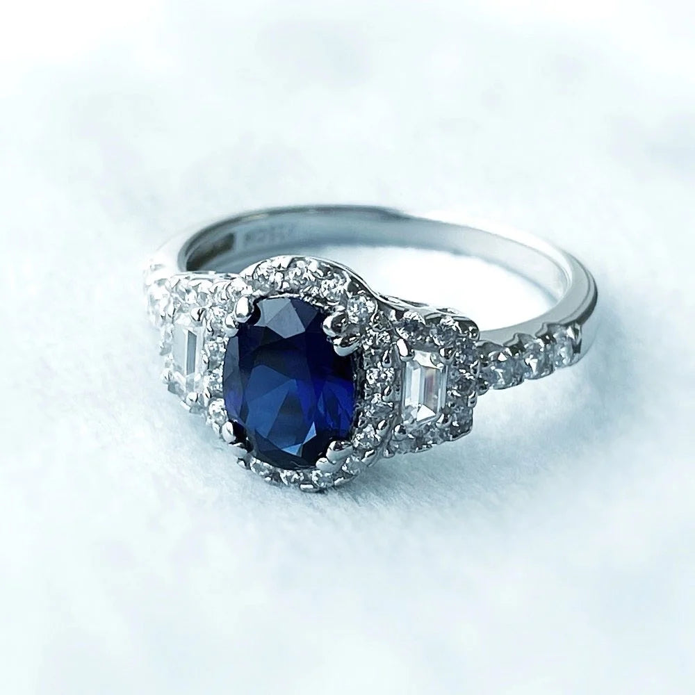 Sterling Silver Simulated Blue Sapphire Cubic Zirconia Halo Ring, Rhodium Plated Size 6 V49678